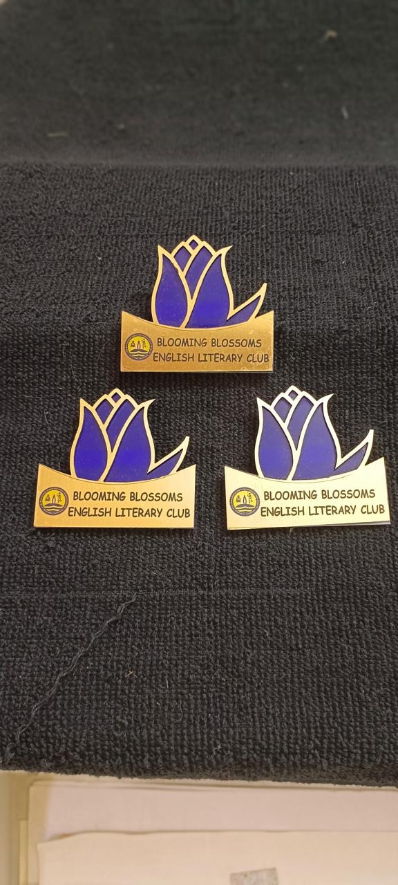 Golden colouring badge with pin